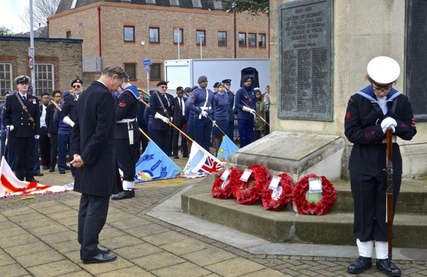 Matthew laying a wreath