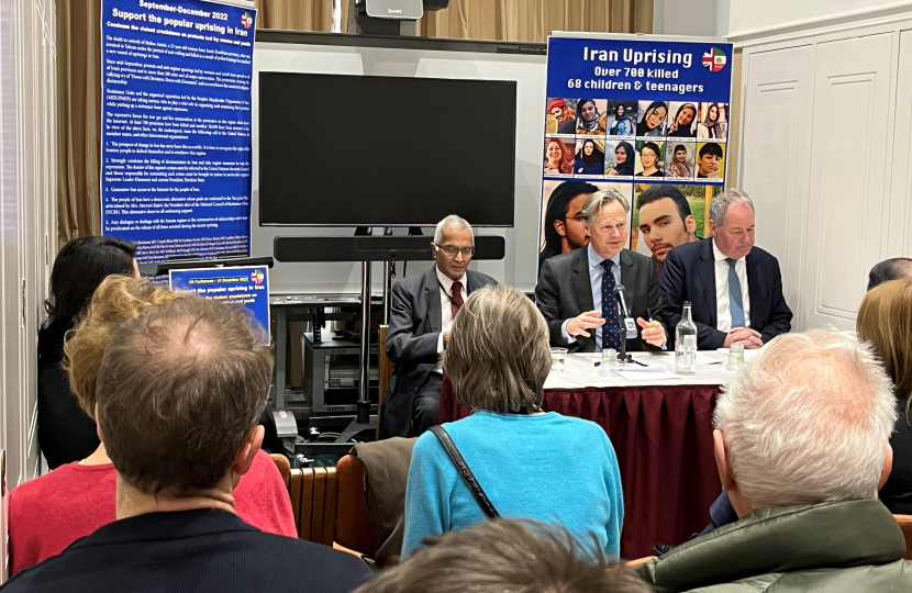 Matthew Offord addressing MPs and guests at a conference on the subject of Iran