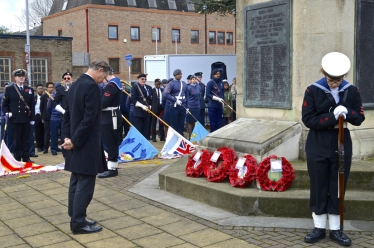 Matthew laying a wreath