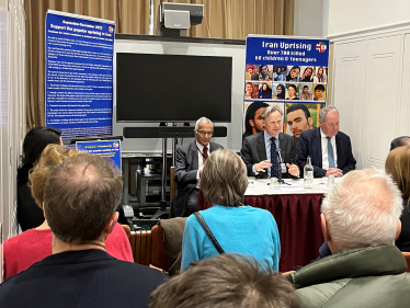 Matthew Offord addressing MPs and guests at a conference on the subject of Iran